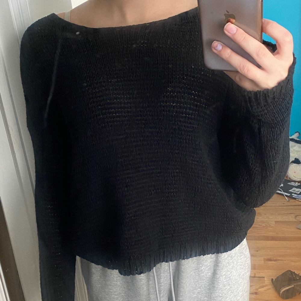 Plain black cozy sweater with cross back
